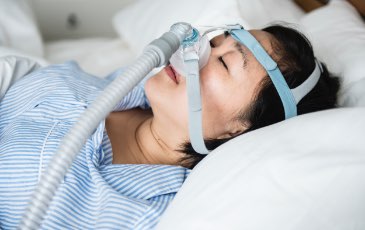 woman wearing a sleep mask